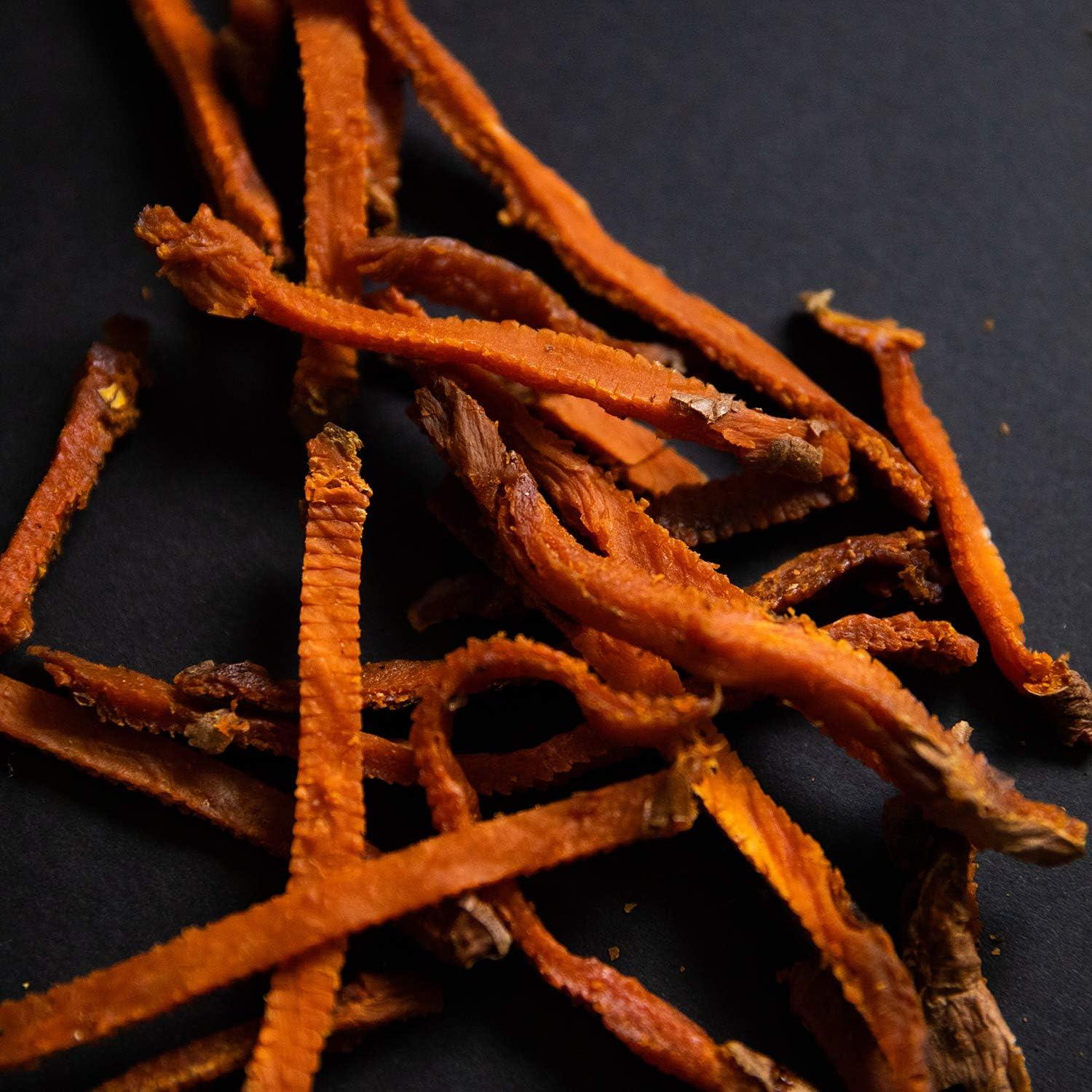 All-natural sweet potato dog treats, dried and chewy, made in USA for safe, digestible snacking.